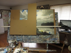 Working on a piece this big (36x48) can be a little overwhelming at times. I will often crop down to certain parts of the painting, to zero in on them so to speak in order keep me on track. This is easily done with L - shaped pieces of cardboard as in this photo
